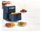 Tefal Easy Fry & Grill XXL airfryer met diverse gerechten op een tafel.