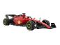 Rode Ferrari Formule 1 modelauto met nummer 16 en sponsorlogo's.