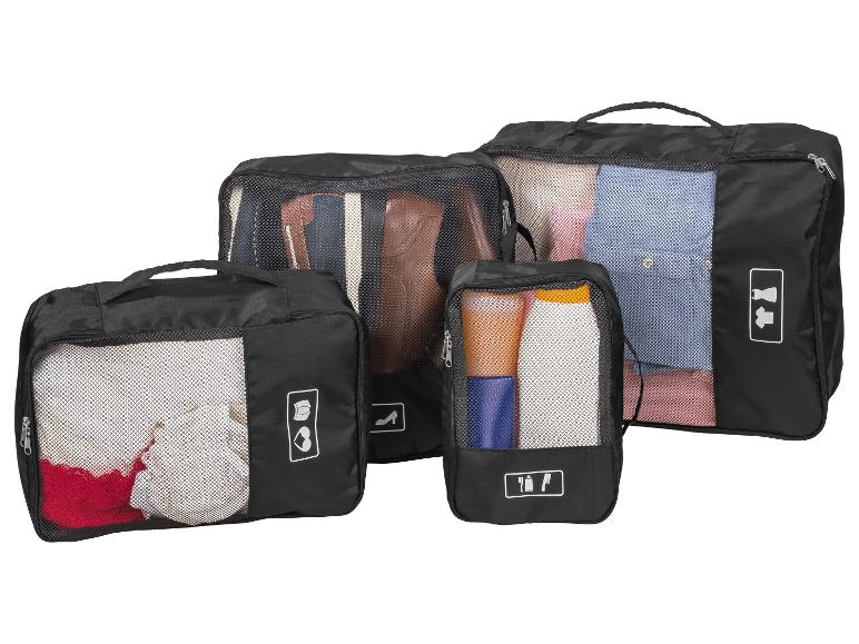 Set zwarte reistassen met gaasvakken voor kleding en schoenen.