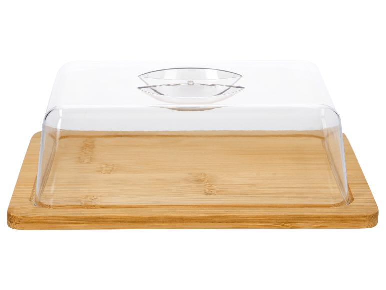 Houten plank met transparante plastic deksel voor kaas of boter.