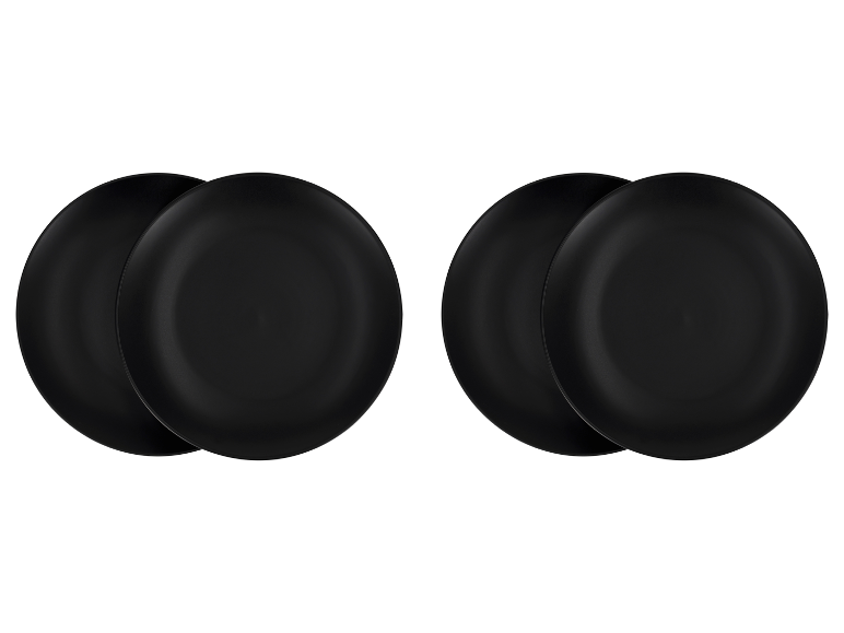 Vier zwarte borden, gepaard gestapeld.