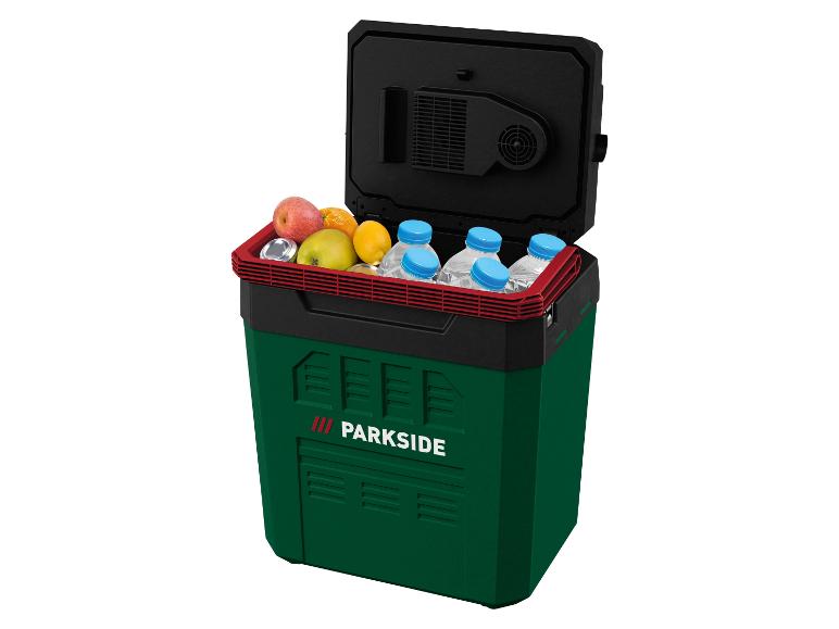 Groene Parkside koelbox met fruit en waterflessen.