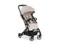 Beige Hauck Travel N Care kinderwagen met zwart frame en wielen