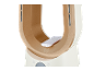 Beige en gouden luchtreiniger met afstandsbediening.