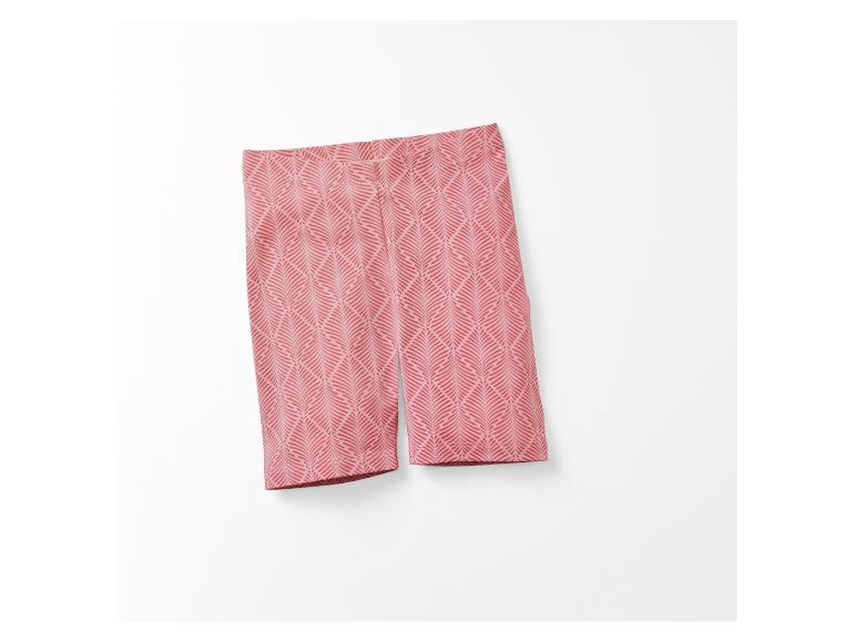 Roze fietsbroek met bladmotief.