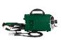Een groene Parkside lasmachine met accessoires.