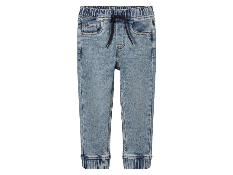 Lichtblauwe denim joggerbroek voor kinderen met trekkoord in de taille en elastische boorden.