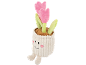Pluche roze tulp in een witte pot met een lachend gezicht.