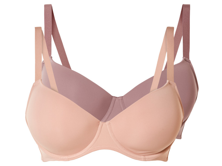 Twee beige bh's met brede bandjes.