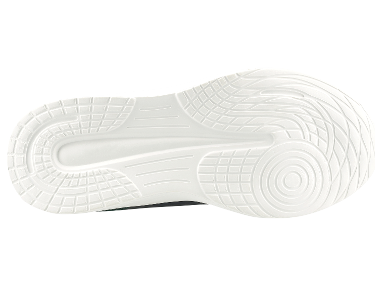 Witte zolen van sportschoenen met textuurdetails.