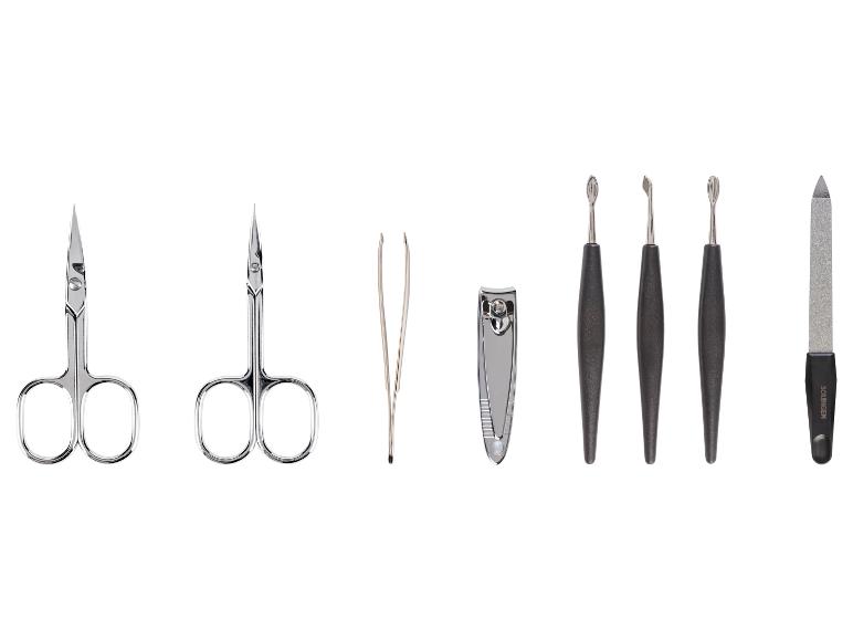 Manicureset met twee scharen, pincet, nagelknipper, drie nagelriemduwers en een nagelvijl.