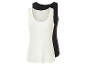 Twee tanktops, een witte en een zwarte.