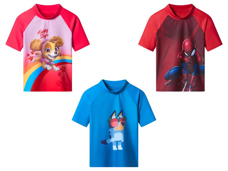 Drie kinderzwemshirts: roze met Skye, rood met Spiderman en blauw met Bluey.