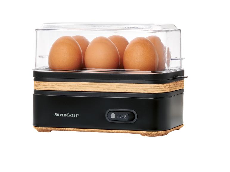 SilverCrest eierenkoker: eieren in een zwart en houten apparaat.