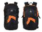 Twee zwarte Crivit rugzakken met oranje accenten, van voren en licht schuin gefotografeerd.