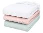 Stapel hoeslakens in wit, roze en mintgroen