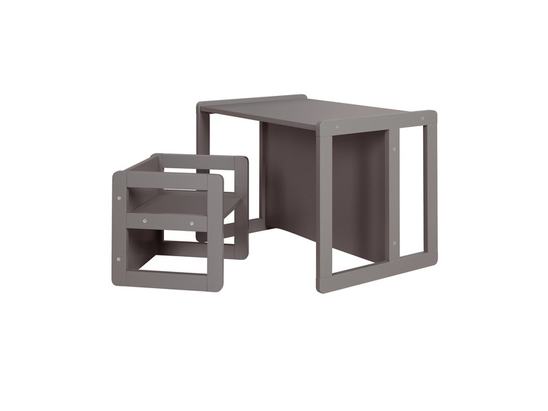 Een grijs houten kinderbureau met stoel.