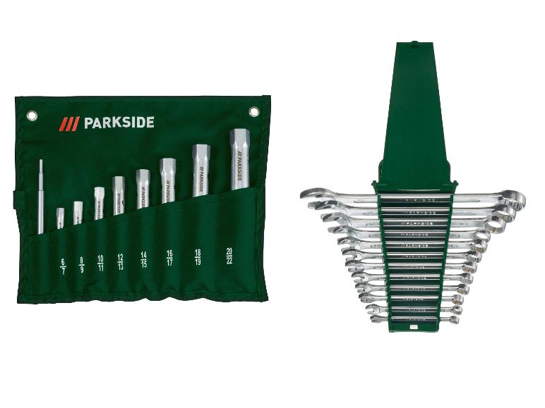 Set dopsleutels in een groene oprolbare stoffen etui en een set combinatiesleutels op een groene houder.