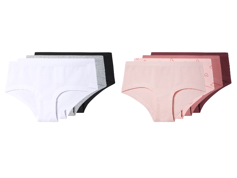 Twee sets slips; één in neutrale kleuren en één in roze tinten.