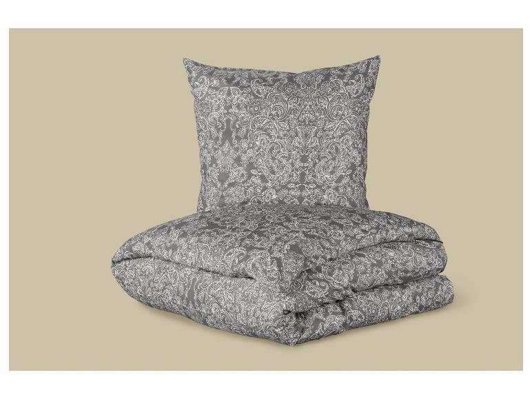 Grijze beddengoedset met een wit patroon, bestaande uit een dekbedovertrek en een kussensloop.