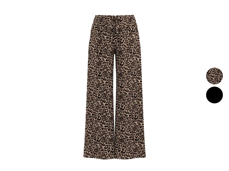 Wijde broek met luipaardprint en trekkoord in de taille.