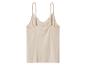 Huidkleurige camisole met dunne bandjes en kanten V-hals.