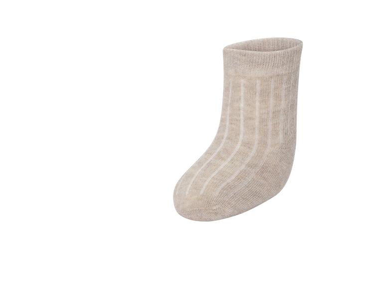 Beige sok met verticale strepen