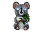 Koalabeeldje met verlichte ogen en een eucalyptus tak.
