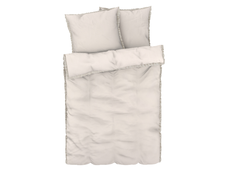 Wit beddengoed met ruffles.