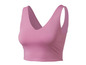Een roze, mouwloos crop top voor dames.