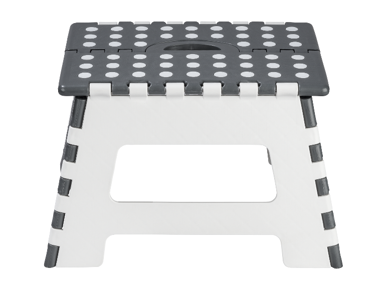 Opvouwbare plastic kruk met grijze en witte stippen.