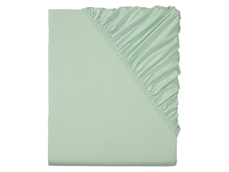 Een mintgroen hoeslaken voor een matras.