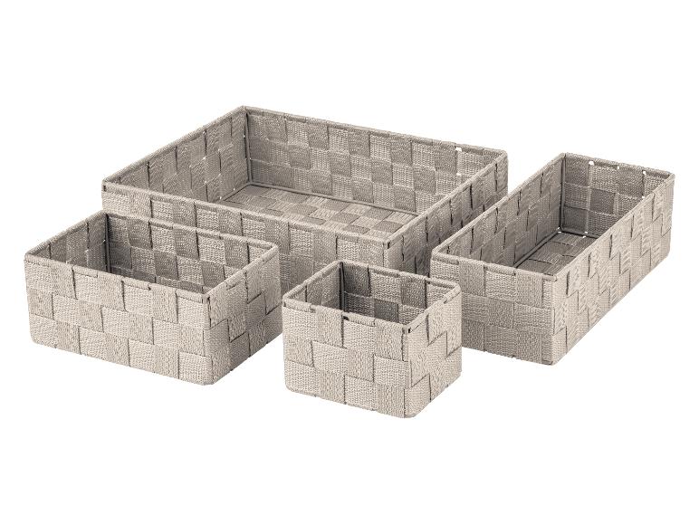 Set beige geweven opbergmanden.
