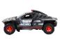 Een zwart Audi e-tron rallyauto speelgoedmodel.