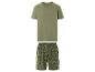 Herenslaappak: effen T-shirt en korte broek met tropisch bladmotief.