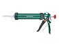 Groen kitpistool met witte spuitmond en zwart handvat.