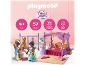 Kinderspeelset met een prinses, slaapkamer, kaptafel en kledingrek.