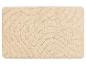 Beige badmat met golvend patroon.