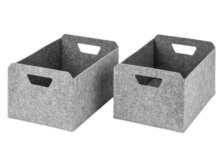 Twee grijze vilten opbergdozen met handvatten