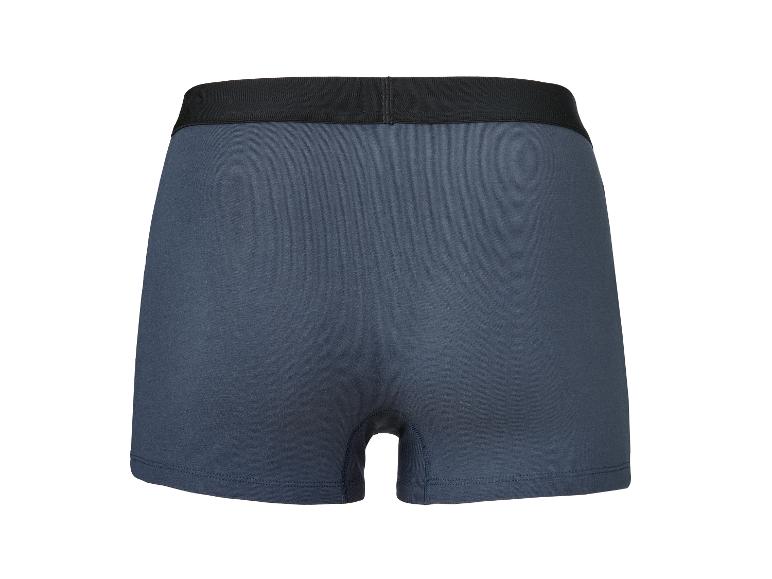 Donkerblauwe boxershort met zwarte elastische tailleband, achteraanzicht