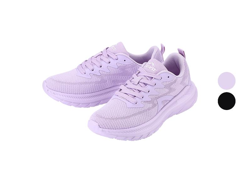 Een paar lichtpaarse sportschoenen met witte zool en een zwarte en paarse cirkel voor kleurkeuze.
