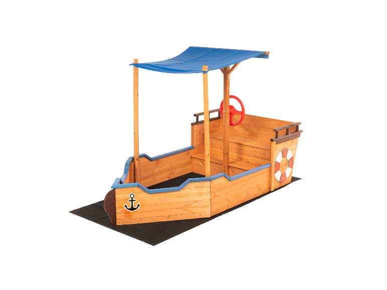 Houten bootvormige zandbak met blauw afdak, rood stuurwiel en reddingsboei decoratie