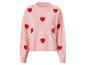 Roze gebreide trui met rode hartpatronen