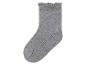 Grijze sok met ruches aan de bovenkant