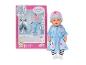 BABY born Deluxe pop in blauwe jurk met konijntjes en roze muts, naast de verpakking.
