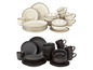 Beige en zwarte servies met kommen en bekers.