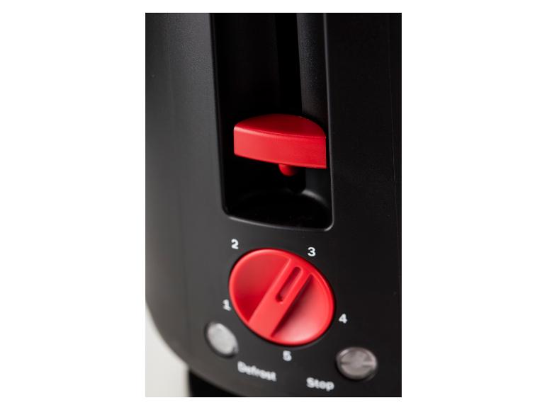 Een zwarte broodrooster met een rode bruiningsknop en een rode hendel.