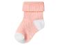 Roze babysokje met witte hiel en teen