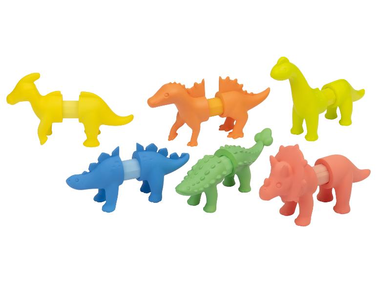 Zes kleurrijke dinosaurus speeltjes met afneembare lichaamsdelen.
