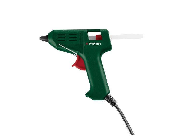 Groen lijmpistool met een witte lijmstift